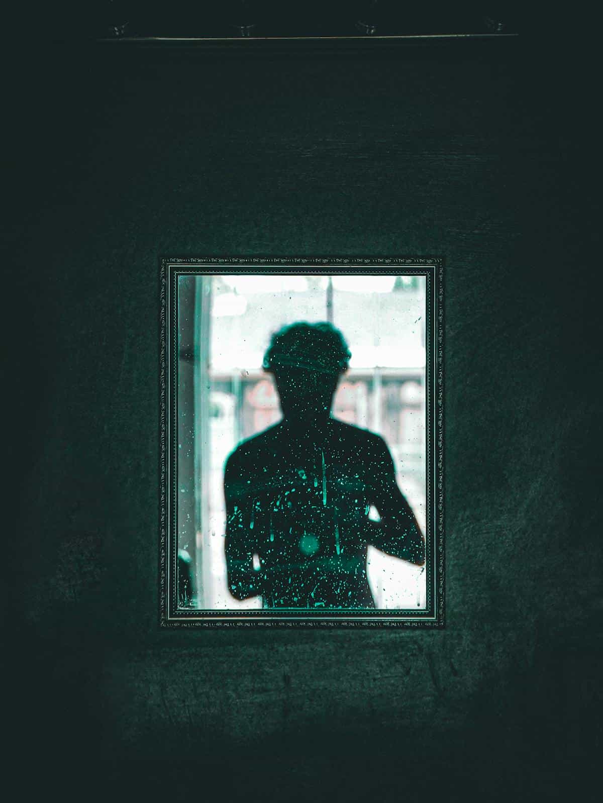 Abstract shadow figure evoking invisible or absent reflection Silhouette and shadow play suggesting depersonalization and the feeling of not seeing yourself clearly