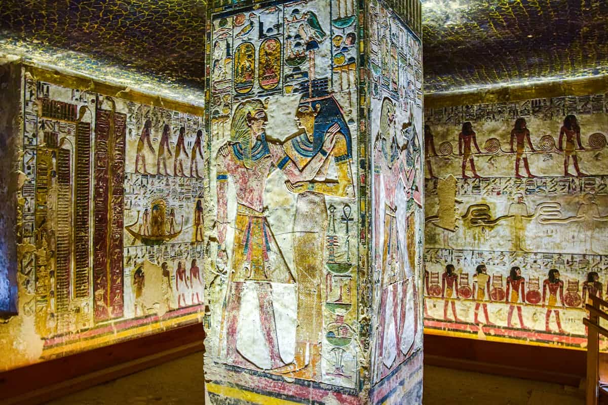 Ornamented interior of the Tomb of Seti I depicting ancient Egyptian funerary art and Ka theology in the Valley of the Kings Detailed wall paintings in the Tomb of Seti I in Egypt's Valley of the Kings showing the ornate funerary art connected to Ka theology and afterlife rituals