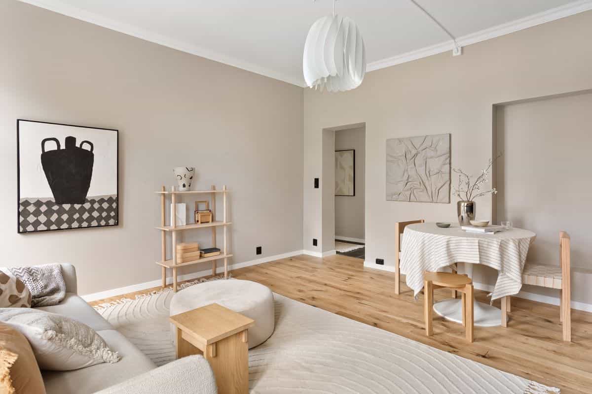 Neutral living room illustrating how feng shui living room colors set the mood of a space Elegant minimalist living room in neutral tones, illustrating how color shapes a feng shui living room