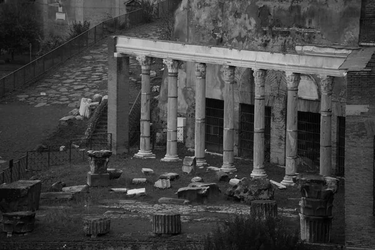 Black and white photograph of ancient Roman Forum ruins in Rome