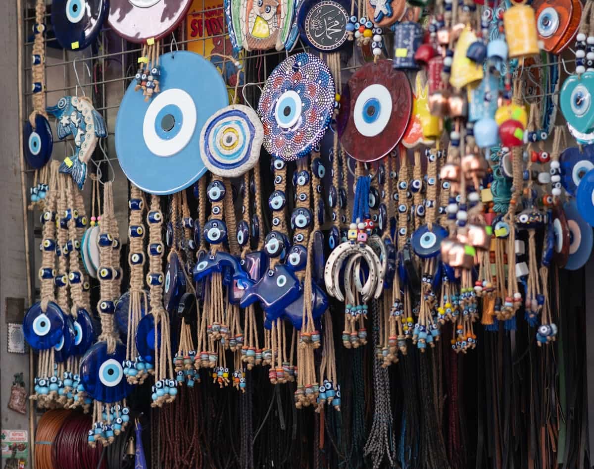 Vibrant display of traditional evil eye beads and trinkets at a market showing Mediterranean and West Asian craft heritage