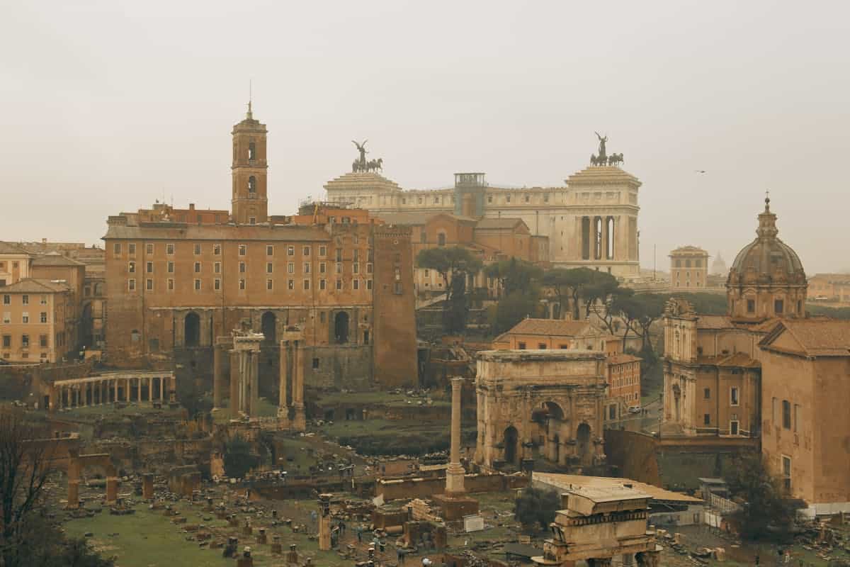 Panoramic view of ancient Roman ruins and historic architecture in Rome Italy