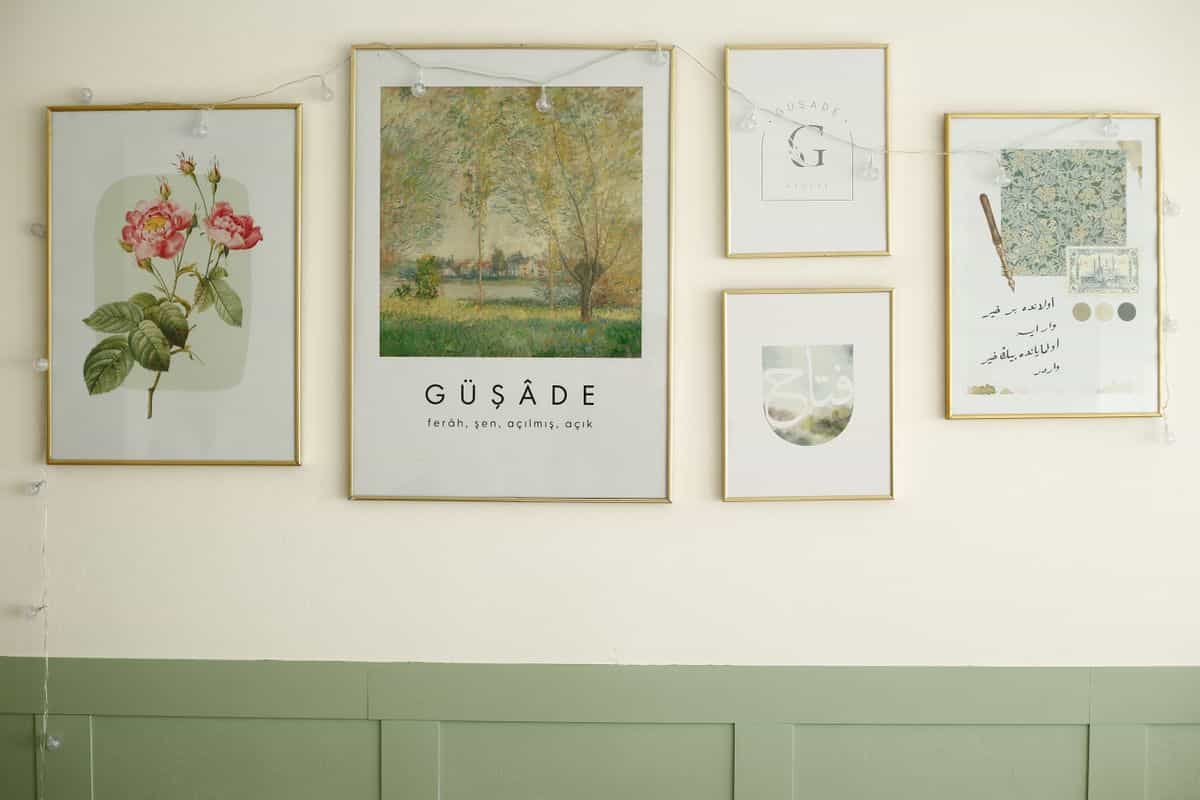 Botanical framed prints arranged on a wall illustrating a magnolia gallery wall A wall arrangement of botanical and abstract framed prints, illustrating a magnolia gallery wall