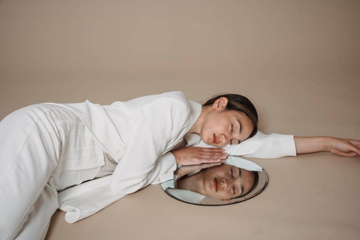 Someone Else in Mirror Dream Meaning: Psychological and Spiritual Interpretations