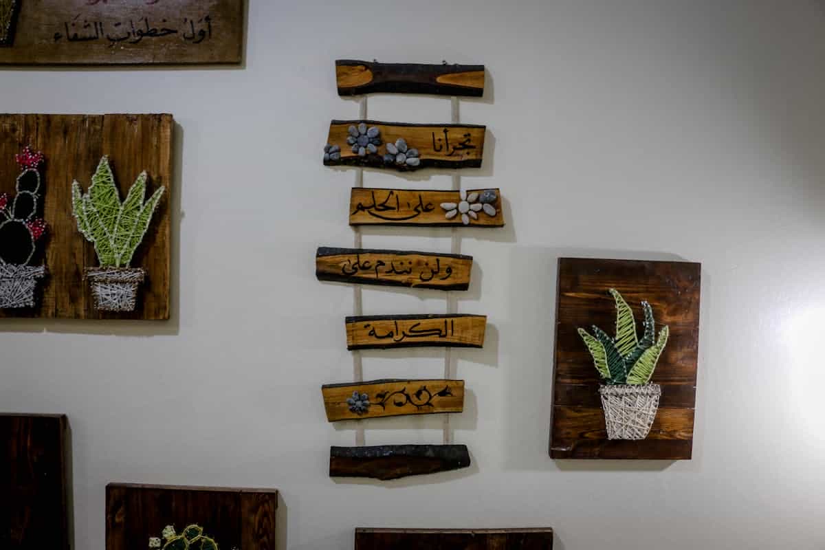 Handcrafted wooden wall plaques with intricate detail, illustrating carved wooden wall decorations